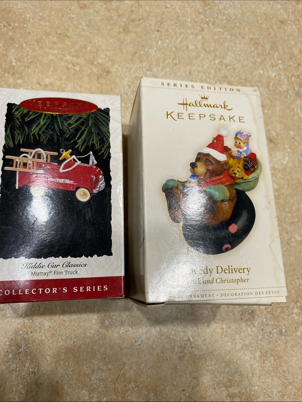 2 Hallmark keepsake ornaments. Kiddie fire truck and speedy delivery near. New